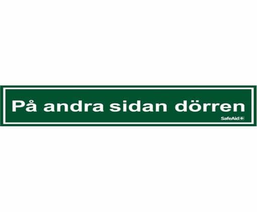 Skylt På andra sidan dörren 21×5 cm